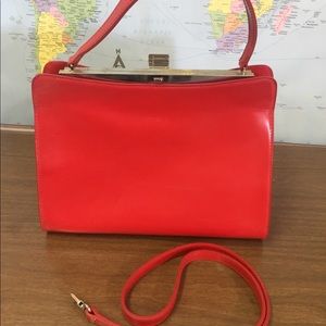 Furla structured handled bag w/strap.